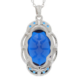 Oval blue sapphire sterling silver pendant with accent, featuring a stunning gemstone and intricate design.